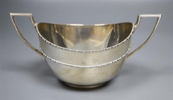 A George V silver two handled sugar bowl, James Deakin & Sons, Sheffield, 1919, 9.5cm, 7.5oz.